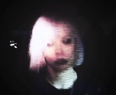 a blurry photo of a child in the dark