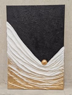 a black and white painting with gold accents