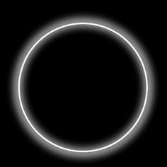 a black background with a white circle in the middle and light at the end that appears to be glowing