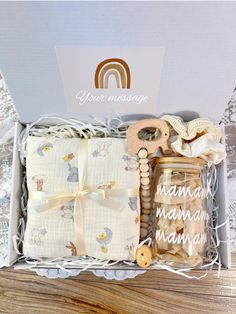 a baby gift set in a white box