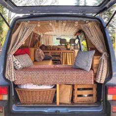 the back end of a van filled with furniture