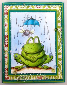 a card with a frog holding an umbrella