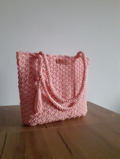 I meticulously crocheted this pink bag using polyester macrame yarn with care and love. It measures 30 cm in width and 24 cm in height. Each bag is unique, intricately woven with special attention to detail. Crochet Granny Square Bag, Macrame Yarn, Knitted Bag, Granny Square Bag, Crochet Granny Square, Boho Accessories, Gift For Woman, Handmade Bag, Bag Crochet