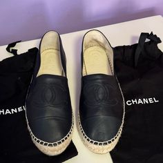 Authentic Chanel Black Leather Cc Logo Espadrilles Slip On Black Jute Trim Round-Toes Platform The Shoes Are New, But They Wear Tried On So There Is Minor Wear At Insoles And Right Has Ear Like At Leather Please See Pictures Size 40 It Comes With Two Dust Bags Insole Measurements-9.75” Outsole 10.5” Shoes Chanel, Leather Espadrilles, Chanel Black, Cc Logo, Chanel Shoes, Espadrille Shoes, Lambskin Leather, Picture Sizes, Espadrilles