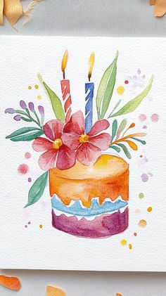 a watercolor painting of a birthday cake with candles