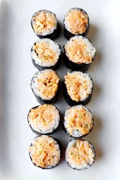 sushi rolls with text overlay that reads poor man's spicy tuna rolls