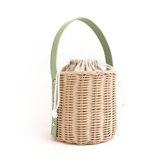 Details: Fully lined drawstring interior High quality rattan Handmade using Italian cowhide leather Finished with Italian hardware Handmade in England by Female Artisans Comes with a dust bag Size & Fit: Total height: 31cm/ 12.2 in Basket height: 16cm / 6.2 in Length: 22cm/ 8.6 in Handle drop: 29cm / 11.4 in Width: 16cm / 6.2 in Fits up to an iPhone 15 Pro Max Leather Bucket Bag With Bamboo Handle In Natural Color, Natural Leather Bucket Bag With Bamboo Handle, Casual Bucket Straw Bag With Intrecciato Weave, Beige Bucket Bag With Intrecciato Weave, Straw Bucket Bag With Intrecciato Weave, Beige Leather Basket Bucket Bag, Leather Bucket Bag With Bamboo Handle For Beach, Leather Bucket Bag With Bamboo Handle For Vacation, Leather Bucket Bag With Bamboo Handle For Daily Use