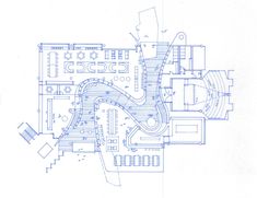 a blueprint drawing of a building with a spiral staircase in the center and an open floor plan below