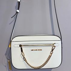 9.5”L, 6.5”T, 2”D White And Gold Michael Kors Crossbody Brand New With Tags! White Michael Kors Shoulder Bag With Branded Hardware, Michael Kors White Shoulder Bag With Branded Hardware, Classic White Shoulder Bag With Chain Strap, Michael Kors White Shoulder Bag With Gold-tone Hardware, Michael Kors White Shoulder Bag With Chain Strap, Designer Michael Kors White Shoulder Bag, Michael Kors Modern White Shoulder Bag, Modern Michael Kors White Shoulder Bag, Modern White Michael Kors Shoulder Bag