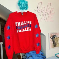 Glitter lettering Phillies Crewneck Phillies Crewneck, Phillies Sweatshirt, Phillies Jersey, Phillie Phanatic, Glitter Letters, Trending Fashion, Carbon Footprint, Cricut Ideas, Cricut Projects