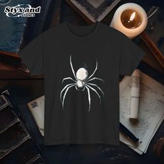 Spider Y2K Shirt  Whether you're into dark aesthetics or simply love unique and eye-catching streetwear, this shirt is a must-have addition to your wardrobe. THE FIT - Runs true to size (Relaxed fit) - For oversized fit go one sizes up your normal size - Comfortable unisex fit - 100% US cotton, ethically grown/harvested - Professional high quality print ORDER & SHIPPING - It will take 2-6 business days to print and ship. Estimated shipping times are given but in almost all cases, the items are delivered before the latest date. AFTERCARE - Wash inside out at 30oC or 90oF - Do not dry clean or tumble dry RETURNS - As every item is made to order we normally can't accept returns - But if you have any issue with your item please contact us we are happy to help Black Fairy Grunge T-shirt For Streetwear, Fairy Grunge Black T-shirt For Halloween, Black Horror Tops For Alternative Fashion, Spider Y2k, Harajuku Goth, Punk Tee, Dark Aesthetics, Chrome White, Oversized Streetwear