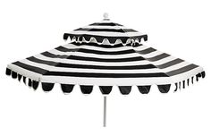 an umbrella with black and white stripes on the top is shown in front of a white background