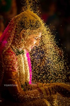 the bride is covered in powder as she looks at her phone