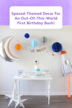 a space themed decor for an out - of - this - world first birthday bash