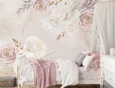 a bedroom with pink and white flowers on the wall