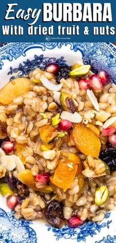 a bowl filled with fruit and nuts on top of a table