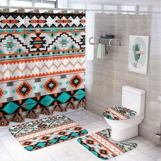 a bathroom with two rugs and a toilet