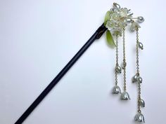 🌸 Add a Touch of Whimsy and Elegance to Your Look! 🌸 1. Exquisite floral design, full of feminine charm, suitable for ladies of any age. 2. Vintage Hanfu style, this hair stick stands out with its delicate lily and pearl decorations. 3. Perfect for weddings, dances, parties, or any special occasion. This timeless piece of jewelry will make you more charming, whether you're a fiancée, daughter, or mother. 4. A thoughtful and special gift for your girlfriend or wife, adding a unique touch to her Hanfu Style, Chinese Hair, Pearl Decorations, Hair Fork, Chinese Hairstyle, Hair Stick, Gifts For Your Girlfriend, Hair Sticks, Flowers In Hair