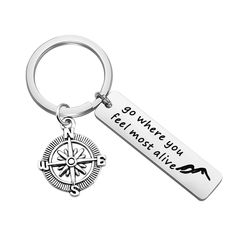 a keychain with a compass on it that says, so where you feel most alive