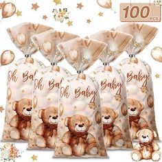 five bags with teddy bears on them sitting next to stars and confetti balls