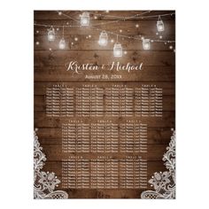 rustic mason jars and string lights wedding seating chart on wooden planks with white lace