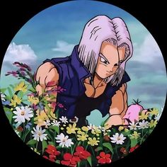 an anime character kneeling in a field of flowers