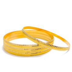 Indulge in timeless elegance with our Vibrant Classic Bangles Set. Crafted from 22k yellow gold and weighing 56.4 grams, this set comprises four bangles with a bangle size of 2.8 and an opening diameter of 2.5 inches. Perfect for complementing any outfit and making a statement PRODUCT DETAILS Gold Purity(karat): 22k Gold Weight(grams): 56.4 Item Finish: Yellow Gold Bangle Size: 2.8 Bangle Opening: 2.5" Number Of Pieces: 4 Bangles Traditional Gold Stackable Bangle, Elegant Yellow Gold Plated Bangle, Gold Stackable Bangle For Festivals, Formal Yellow 22k Gold Bangle, Yellow Gold Hand-set Bangle Jewelry, Gift 22k Gold Yellow Bangle, Traditional Yellow Gold Plated Bangle, Celebration Gold-plated Hand-set Bangle, Stackable Yellow Gold-plated Bangle