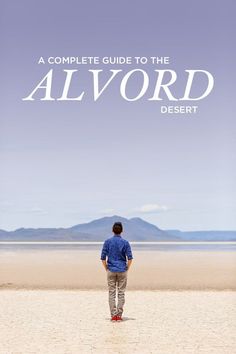 a man standing on top of a sandy beach under a blue sky with the words, a complete guide to the alvord desert