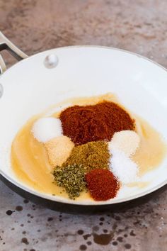 spices and seasonings in a white bowl