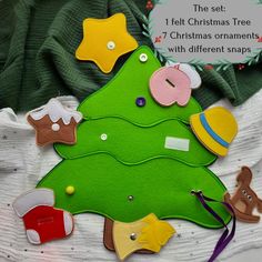 a felt christmas tree with different shapes and sizes