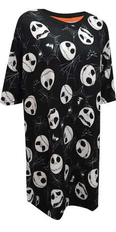 a women's t - shirt with skulls and faces on it