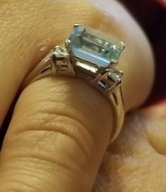 Gorgeous Vintage platinum ring set with magnificent natural aquamarine center natural aquamarine in emerald shape nice blue color aquamarine weight 2.51 carat size 9x7mm very nice luster,beautiful medium blue color. very sparkly,very brilliant stone ,very clean,sparkly. side two natural diamonds total weight 0.35ct G-SI1 ring size 5.5 Retail value $4,500 net . Appraisal available Vintage Platinum Rings, Platinum Engagement Rings Vintage, Emerald Ring Vintage, Platinum Engagement Ring, Best Engagement Rings, Platinum Engagement Rings, Blue Gems, White Gold Engagement, White Gold Engagement Rings