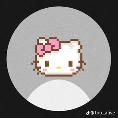 an image of a hello kitty face on a black and white circle with a pink bow