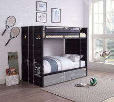 a bunk bed with two sets of tennis rackets on the top and bottom shelf