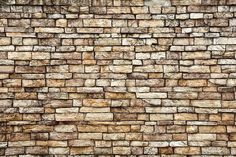 an old brick wall is shown in this image