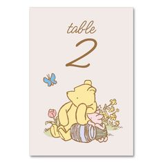 a winnie the pooh table number card