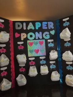 a diaper pong display with lots of diapers on it