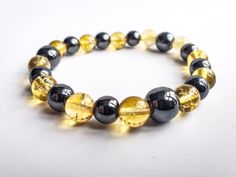 Excited to share this item from my #etsy shop: Genuine Citrine and Hematite Unisex Bracelet Cleansing Crystals, Unisex Bracelets, Minimalist Bracelet, Healing Bracelets, Yellow And Black, Organza Gift Bags, Colorful Bracelets, Earrings Photo, Pittsburgh Steelers