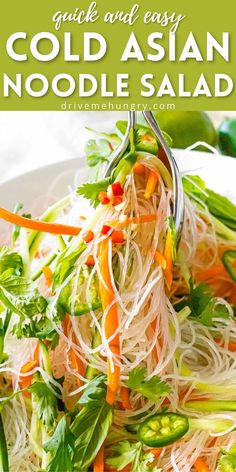 vietnamese noodle salad with carrots and parsley in a white bowl on a table