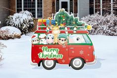 a red vw bus with christmas decorations on top