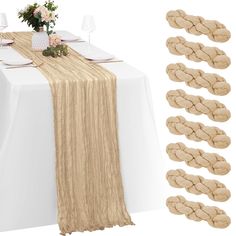 the table is set with white plates and napkins, along with several pieces of rope