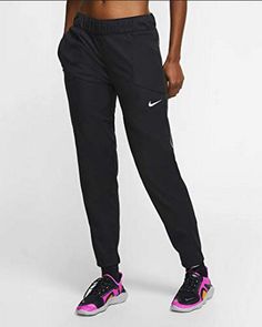 Nike Shield Dri-Fit Women Running Pants Black BV3311 010  100% Authentic, Brand New with tag Women Size: Medium - Large Style # BV3311 010 Product Details: The Nike Shield Pants are your go-to for allover coverage. Get after it regardless of wind or rain in soft, smooth fabric. Nike Shield fabric resists elements like wind and water. It's made of a medium weight knit fabric that feels soft and smooth. The slim fit tapers towards the bottom for a snug fit around your ankles to help keep the cold Black Straight Leg Cargo Pants For Sports, Fitted Sports Pants With Tapered Leg, Fitted Tapered Leg Sports Pants, Black Mid-rise Functional Pants, Functional Mid-rise Black Pants, Functional Black Mid-rise Pants, Nike Full Length Sports Bottoms, Nike Tapered Leg Sports Bottoms, Nike Full Length Workout Pants