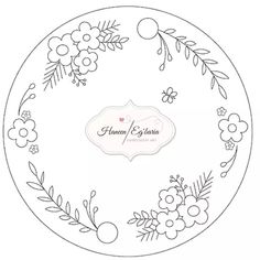 a white plate with flowers and leaves on the side, in black ink that says happy e