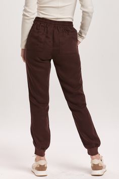 Super high rise cropped jogger pants with drawstring option to wear tightly or loosely for a comfy wear. Perfect for any me time, when you just want to cozy up! Solid color woven on relaxed fit.11 1/2" Front Rise (include waistband), 9 1/2" Leg Opening, 26 1/2" inseam (Size Small) 100% TENCEL Machine wash cold, Tumble dry low Imported Tencel Denim, Denim Essentials, Comfy Wear, Cropped Joggers, Jumpsuit Jacket, Ground Coffee, Medium Wash Jeans, Comfy Sweaters, Sweater Sale