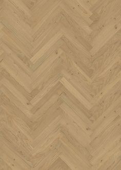 an image of wood flooring that looks like herringbones