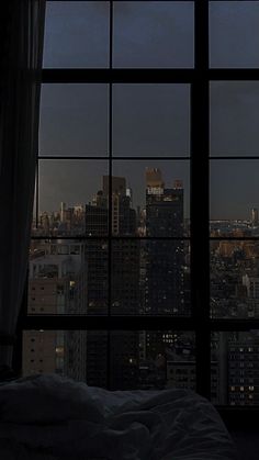 a window view of the city at night