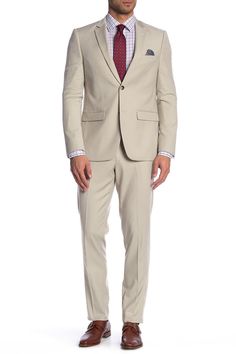 Freshen up your formalwear with this crisp two-piece suit featuring a patterned lining on the jacket and a horizontal strap across the pant's placket. Lined 68% polyester, 30% viscose, 2% spandex Dry clean Imported Single Breasted Business Casual Suiting Sets, Single Breasted Suiting Fabric Sets For Business Casual, Slim Fit Business Casual Sets With Notch Lapel, Slim Fit Suit For Semi-formal Spring Events, Fitted Suits In Suiting Fabric For Spring, Fitted Suiting Fabric Suits For Spring, Fitted Spring Suits In Suiting Fabric, Fitted Spring Suits, Spring Fitted Business Casual Sets