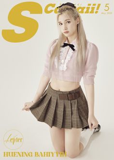 a girl in a skirt and sweater posing for the cover of sns magazine, with her hand on her hip