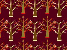 a red and green tree pattern on a maroon background