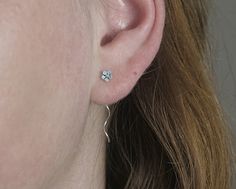 Very very delicate sterling silver threader earrings with a small forget me not flower. The flowers' front is light blue enameled. The chain ends with a curved pin which threads easily through the earhole and twists nicely around when moving.... The earrings are very light, comfortable to wear and there is no chance of loosing them. A matching ring is also available in my shop via: https://www.etsy.com/your/shops/VillaSorgenfrei/tools/listings/page:7,view:table,stats:true/511288299 All my items Silver Threader Earrings, Forget Me Not Flower, Earrings Dainty, Matching Rings, Threader Earrings, Forget Me Not, Stud Earring, Diamond Earrings, Blossom